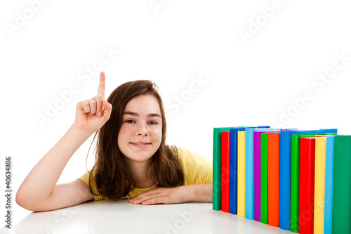 Photo: Girl learning isolated on white background Girl learning isolated on white background