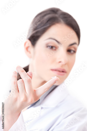 Foto: Optometrist Holding Contact Lens Optometrist Holding Contact Lens
