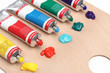 Photo: Five paint tubes over a pallete Five paint tubes over a pallete