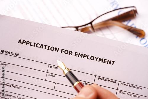 Photo: Completing an employment application Completing an employment application