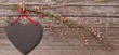 Schieferherz mit Blumen