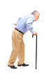 Full length portrait of a senior man walking with cane