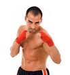 Foto: Portrait of young boxer fighter over white background Portrait of young boxer fighter over white background