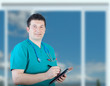 Photo: Male nurse taking notes Male nurse taking notes