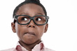 Thinking boy, funny face expression closeup