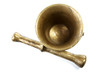 Brass mortar with a pestle isolated on a white Brass mortar with a pestle isolated on a white