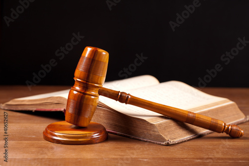 Photo: judge gavel and law bok judge gavel and law bok