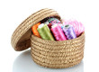 bright bobbin thread in basket isolated on white.
