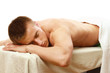 Young smart male enjoying massage