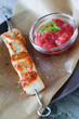 Rhubarb sauce and skewers of chicken
