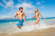 Photo: Young Couple on Tropical Beach Young Couple on Tropical Beach