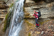 Girl near waterfall
