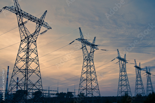 Photo: Pylon and transmission power line in sunset Pylon and transmission power line in sunset