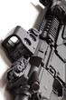 Modern tactical laser sght on assault carbine close-up. Modern tactical laser sght on assault carbine close-up.