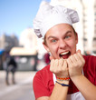portrait of young cook man screaming at street portrait of young cook man screaming at street