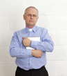 Mature pastor with his tablet pc