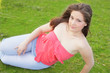 Woman posing on the grass