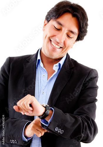 Foto: Businessman watching the time Businessman watching the time