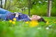 Portrait of cute teenage girl relaxing in spring park Portrait of cute teenage girl relaxing in spring park