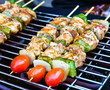 Sizzling barbecue sticks with meat and vegetables