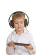 Photo: Boy with electronic pad and phones Boy with electronic pad and phones