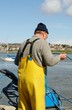 Fisherman tending nets