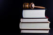 Gavel Atop Legal Texts Gavel Atop Legal Texts
