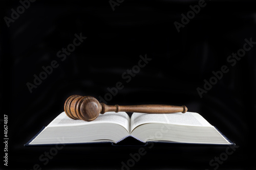 Photo: Gavel Atop Legal Texts Gavel Atop Legal Texts