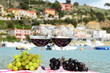 Pair of wineglasses and grapes. Portvenere, Italy