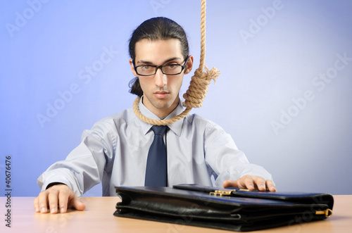Photo: Businessman ready to commit suicide Businessman ready to commit suicide