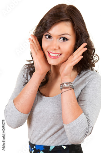 Photo: beautiful teenage girl smiling, looking at camera beautiful teenage girl smiling, looking at camera