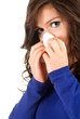 sad woman with snotty, runny nose and handkerchief