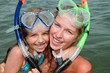 Summer beach - lovely girls diver in the sea