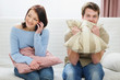 Young man frustrated of girlfriends long phone talking