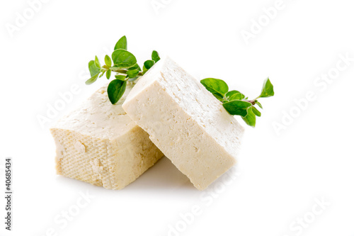 Photo: tofu cheese on white background tofu cheese on white background