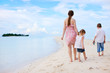 Mother and two kids on beach Mother and two kids on beach
