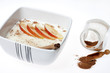 rice pudding with apple slices and cinnamon