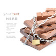 Chocolate bars tied up with chains