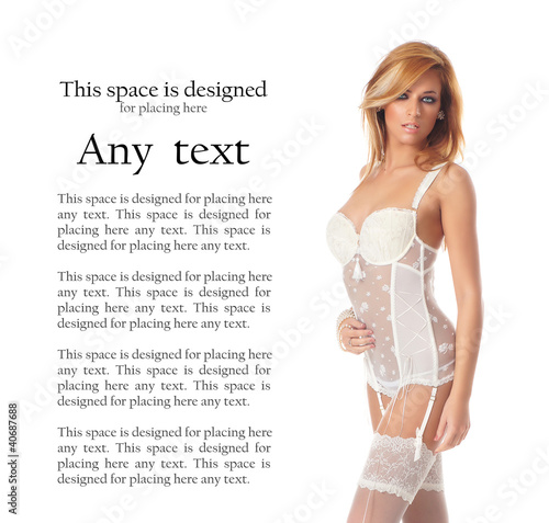Photo: A young redhead Caucasian woman in white lingerie A young redhead Caucasian woman in white lingerie