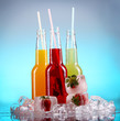 Colorful cocktails over blue background