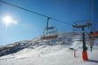 Ski lifts and slope with protection from avalanches