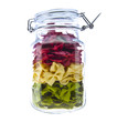 Jar of coloured pasta isolated on white Jar of coloured pasta isolated on white