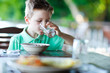 Little boy drinking water