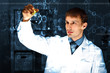 Young chemist working in laboratory Young chemist working in laboratory