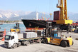 Foto: commercial harbor with truck forklift and ship commercial harbor with truck forklift and ship