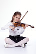 Young girl playing the violin