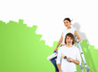 Young couple with paint brushes together Young couple with paint brushes together