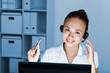 Young woman in business wear and headset