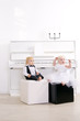 boy and girl in a suit sitting in a concert interior boy and girl in a suit sitting in a concert interior
