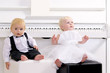 boy and girl in a suit sitting in a concert interior boy and girl in a suit sitting in a concert interior
